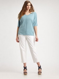 One touch and you'll see why this soft-linen top is a must-have. Plus, it features a feminine v-neckline, modern dolman sleeves and a relaxed-yet-flattering fit. V-neckElbow-length sleevesFront and back seamPull-on styleAbout 30 from shoulder to hemLinenHand washImported