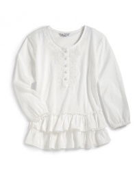 THE LOOKRound necklineLong elastic cuff sleevesFront button closureTonal embroideryTiered ruffled hemTHE MATERIALCottonCARE & ORIGINMachine washImported THE LOOKRound necklineLong elastic cuff sleevesFront button closureTonal embroideryTiered ruffled hemTHE MATERIALCottonCARE & ORIGINMachine washImported