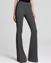 Flaunt chic style with these flared Rachel Zoe pants finished with classic tuxedo stripes. Flaunt chic style with these flared Rachel Zoe pants finished with classic tuxedo stripes.