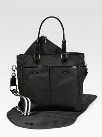 A roomy top-handle carryall, perfectly sized for all your essentials.Double top handles, 8 dropDetachable shoulder strap, 15½-25 dropOpen topFive outside open pocketsProtective metal feetOne removable changing matOne removable zip pouchOne pen holderOne inside zip pocketOne inside open pocketCotton lining12½W X 12¾H X 5½DImported A roomy top-handle carryall, perfectly sized for all your essentials.Double top handles, 8 dropDetachable shoulder strap, 15½-25 dropOpen topFive outside open pocketsProtective metal feetOne removable changing matOne removable zip pouchOne pen holderOne inside zip pocketOne inside open pocketCotton lining12½W X 12¾H X 5½DImported