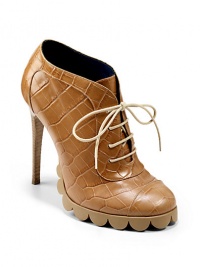 THE LOOKCroc-embossed leatherLace-up frontRound toeScalloped rubber solePadded insoleStacked heel, 5 (125mm)Rubber platform, 1 (25mm)Compares to a 4 heel (100mm)THE MATERIALLeather upperLeather liningRubber soleORIGINMade in Italy THE LOOKCroc-embossed leatherLace-up frontRound toeScalloped rubber solePadded insoleStacked heel, 5 (125mm)Rubber platform, 1 (25mm)Compares to a 4 heel (100mm)THE MATERIALLeather upperLeather liningRubber soleORIGINMade in Italy