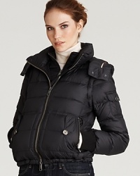 This puffer's got a secret life. Burberry Brit's cool design lets you zip off the sleeves and the hood, and in a flash, it's a vest. This puffer's got a secret life. Burberry Brit's cool design lets you zip off the sleeves and the hood, and in a flash, it's a vest.