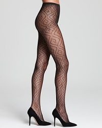 HUE combines a swirling geometric print with fishnet tights for a luxe leg look. Style #U13110. HUE combines a swirling geometric print with fishnet tights for a luxe leg look. Style #U13110.