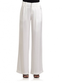 THE LOOKBanded waistZip fly with slide tab closureAngled front pocketsPleated frontBack welt pocketsTHE FITRise, about 11Inseam, about 32THE MATERIALTriacetae/polyesterCARE & ORIGINDry cleanMade in the USAModel shown is 5'10 (177cm) wearing US size 4. THE LOOKBanded waistZip fly with slide tab closureAngled front pocketsPleated frontBack welt pocketsTHE FITRise, about 11Inseam, about 32THE MATERIALTriacetae/polyesterCARE & ORIGINDry cleanMade in the USAModel shown is 5'10 (177cm) wearing US size 4.