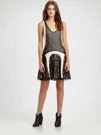A sheer overlay, intricate paneling and shimmering sequins define this party-ready frock.ScoopneckSleevelessInvisible side zipperOpen backFully linedAbout 20 from natural waistBody: Triacetete/PolyesterOverlay: Nylon/Gold Sequins/SilkDry cleanMade in the USAModel shown is 5'10 (177cm) wearing US size Small. A sheer overlay, intricate paneling and shimmering sequins define this party-ready frock.ScoopneckSleevelessInvisible side zipperOpen backFully linedAbout 20 from natural waistBody: Triacetete/PolyesterOverlay: Nylon/Gold Sequins/SilkDry cleanMade in the USAModel shown is 5'10 (177cm) wearing US size Small.