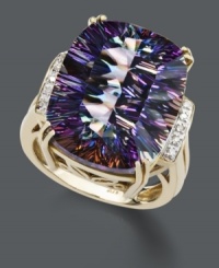 Capture a myriad of colors all in one beautiful cocktail-style ring. Crafted in 14k gold, a large mystic topaz gemstone (11 ct. t.w.) is decorated at the sides by sparkling diamond accents. Capture a myriad of colors all in one beautiful cocktail-style ring. Crafted in 14k gold, a large mystic topaz gemstone (11 ct. t.w.) is decorated at the sides by sparkling diamond accents.