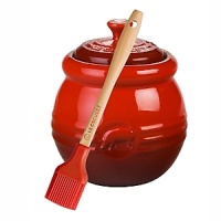 Charming stoneware pot includes a silicone and wood basting brush. Charming stoneware pot includes a silicone and wood basting brush.