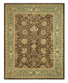 Alluring arabesques weave an inspiring design on this earth-toned area rug from Safavieh. Tufted in India from pure wool, this rug emerges from the annals of antiquity to bring spectacular style and time-honored quality to your home. (Clearance)