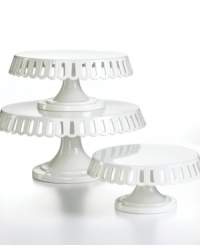 Dessert just got sweeter. A pierced edge lends feminine frills to this already-graceful white porcelain cake stand from Martha Stewart Collection. Dessert just got sweeter. A pierced edge lends feminine frills to this already-graceful white porcelain cake stand from Martha Stewart Collection.