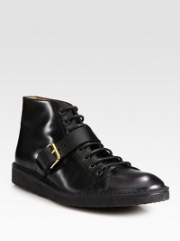 Side strap and buckle detail adds a gentleman's touch to this athletic-inspired lace-up bootie, expertly crafted in smooth Italian leather for a long-lasting finish.Leather upperLeather liningPadded insoleRubber soleMade in Italy Side strap and buckle detail adds a gentleman's touch to this athletic-inspired lace-up bootie, expertly crafted in smooth Italian leather for a long-lasting finish.Leather upperLeather liningPadded insoleRubber soleMade in Italy