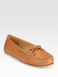 Vibrant leather and intricate stitching shape a classic moccasin design. Leather upperLeather lining and solePadded insoleOUR FIT MODEL RECOMMENDS ordering true whole size; ½ sizes should order the next whole size up. Additional Information Women's Shoe Size Guide (International Equivalents) Vibrant leather and intricate stitching shape a classic moccasin design. Leather upperLeather lining and solePadded insoleOUR FIT MODEL RECOMMENDS ordering true whole size; ½ sizes should order the next whole size up. Additional Information Women's Shoe Size Guide (International Equivalents)