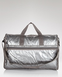 Cooly blending practical design with a fashionable feel, LeSportsac' roomy nylon duffel makes a smart travel companion. Cooly blending practical design with a fashionable feel, LeSportsac' roomy nylon duffel makes a smart travel companion.