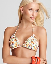 Shoshanna makes florals feel fresh, feminine and ready for a dip in the deep end. With ruffled detailing, this string bikini is a perfect poolside option for the girlie girl. Shoshanna makes florals feel fresh, feminine and ready for a dip in the deep end. With ruffled detailing, this string bikini is a perfect poolside option for the girlie girl.