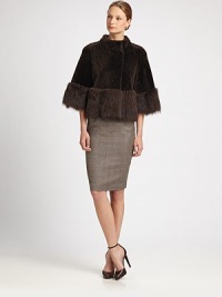 This cropped, reversible style features supple leather on one side and soft shearling on the other.Stand collarSnap closuresShort sleevesBanded shearling trimReversibleAbout 22 from shoulder to hemDyed sheepskinDry cleanImportedFur origin: Spain and ItalyModel shown is 5'11 (180cm) wearing US size 4.This style runs large. We recommend ordering one size down for a standard fit. This cropped, reversible style features supple leather on one side and soft shearling on the other.Stand collarSnap closuresShort sleevesBanded shearling trimReversibleAbout 22 from shoulder to hemDyed sheepskinDry cleanImportedFur origin: Spain and ItalyModel shown is 5'11 (180cm) wearing US size 4.This style runs large. We recommend ordering one size down for a standard fit.