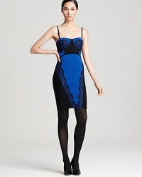 This stunning, party-perfect Blaque Label dress casts the spotlight on bold color blocked details and lace--two of fall's hottest trends--in a provocative, bustier-style silhouette. This stunning, party-perfect Blaque Label dress casts the spotlight on bold color blocked details and lace--two of fall's hottest trends--in a provocative, bustier-style silhouette.