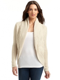 THE LOOKCable-knit designCocoon silhouetteOpen frontRibbed shawl collar and hemLong sleevesTHE FITAbout 27 from shoulder to hemTHE MATERIALCashmere/merino/viscose/polyamideCARE & ORIGINDry cleanImportedModel shown is 5'8 (173cm) wearing US size Small. THE LOOKCable-knit designCocoon silhouetteOpen frontRibbed shawl collar and hemLong sleevesTHE FITAbout 27 from shoulder to hemTHE MATERIALCashmere/merino/viscose/polyamideCARE & ORIGINDry cleanImportedModel shown is 5'8 (173cm) wearing US size Small.