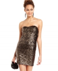 Watch the ball drop in Sugar & Spice's strapless, sweetheart-style party dress! A body of glimmering sequins makes this number ideal for a fanciful night. Watch the ball drop in Sugar & Spice's strapless, sweetheart-style party dress! A body of glimmering sequins makes this number ideal for a fanciful night.