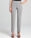 Crisp pleats create a sharp look on these stretch-wool Armani Collezioni pants, perfect for the office this fall with a silk blouse and strappy pumps.