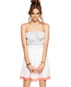 Jolt plays the ultimate print mixologist, pairing a striped bodice with a polkadot-print skirt on this super-cute day dress!