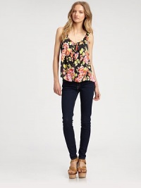 Revived by a vibrant floral print, this hi-low tank has a button front, playful pleating and an unanticipated scoopback. ScoopneckSleevelessButton frontScoopbackHi-low hemPolyesterDry cleanImportedModel shown is 5'10 (177cm) wearing US size Small. Revived by a vibrant floral print, this hi-low tank has a button front, playful pleating and an unanticipated scoopback. ScoopneckSleevelessButton frontScoopbackHi-low hemPolyesterDry cleanImportedModel shown is 5'10 (177cm) wearing US size Small.