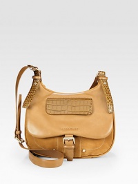 Crocodile embossed, split velvet and nubuck creates a luxurious blend of treated leathers in a convenient crossbody design.Adjustable shoulder strap, 19-26½ dropMagnetic snap flap closureOne outside flap pocket on flapOne open pocket under flapTwo inner compartmentsOne inside zip pocketTwo inside open pocketsFully lined 11¾W X 9½H X 4¾DImported Crocodile embossed, split velvet and nubuck creates a luxurious blend of treated leathers in a convenient crossbody design.Adjustable shoulder strap, 19-26½ dropMagnetic snap flap closureOne outside flap pocket on flapOne open pocket under flapTwo inner compartmentsOne inside zip pocketTwo inside open pocketsFully lined 11¾W X 9½H X 4¾DImported