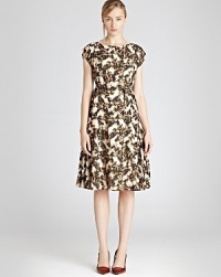 Light enough to slip into your transitional wardrobe, this smudgy print dress has a distinctly autumnal look. Wear it with jewel-tone pumps for an on-trend color infusion and be sure to keep your silhouette defined with the self-tie belt. Light enough to slip into your transitional wardrobe, this smudgy print dress has a distinctly autumnal look. Wear it with jewel-tone pumps for an on-trend color infusion and be sure to keep your silhouette defined with the self-tie belt.