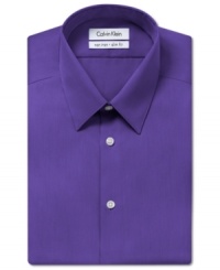 Saturated color and a slim fit take this no-iron Calvin Klein dress shirt from basic to modern in an instant. Saturated color and a slim fit take this no-iron Calvin Klein dress shirt from basic to modern in an instant.