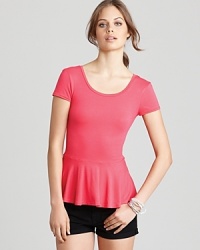 This pretty-in-pink Aqua top flaunts a ladylike peplum for a feminine spin on the basic style. This pretty-in-pink Aqua top flaunts a ladylike peplum for a feminine spin on the basic style.