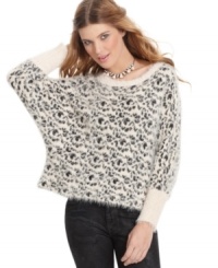 Feel as fierce as a leopard in XOXO's angora sweater featuring long dolman sleeves and a fashion-forward oversized fit! Feel as fierce as a leopard in XOXO's angora sweater featuring long dolman sleeves and a fashion-forward oversized fit!