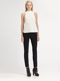 Explore the feminine side of modern with this crisp sleeveless bib shirt, styled by a banded collar, sleeveless silhouette and captivating back slit. Banded collarButton frontSleevelessSplit backCotton/nylon/polyurethaneDry cleanImported of Italian fabricSIZE & FITModel shown is 5'10 (177cm) wearing US size 4. Explore the feminine side of modern with this crisp sleeveless bib shirt, styled by a banded collar, sleeveless silhouette and captivating back slit. Banded collarButton frontSleevelessSplit backCotton/nylon/polyurethaneDry cleanImported of Italian fabricSIZE & FITModel shown is 5'10 (177cm) wearing US size 4.