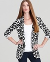 Whether working the office or wowing after hours, this graphic-print DIANE von FURSTENBERG jacket packs a bold punch.