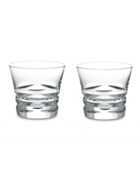 Classic technique, modern beauty. Crafted of fine crystal, the Lola double old-fashioned glasses from the Baccarat drinkware collection pair horizontal wedge cuts, thick shams and a silhouette that radiates grace and sophistication.
