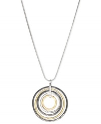 Round and resplendent. This necklace from Nine West is crafted from silver-tone mixed metal, with a pendant made of the same-plus gold-tone and hematite-tone mixed metal-for a stunning effect. Approximate length: 16 inches + 2-inch extender. Approximate drop: 2 inches. Approximate diameter: 1-7/8 inches. Round and resplendent. This necklace from Nine West is crafted from silver-tone mixed metal, with a pendant made of the same-plus gold-tone and hematite-tone mixed metal-for a stunning effect. Approximate length: 16 inches + 2-inch extender. Approximate drop: 2 inches. Approximate diameter: 1-7/8 inches.