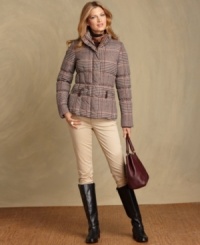 A classic plaid print modernizes Tommy Hilfiger's puffer coat, while a soft down fill makes it as cozy as ever. A classic plaid print modernizes Tommy Hilfiger's puffer coat, while a soft down fill makes it as cozy as ever.