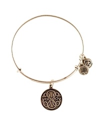 Simply styled in plated silver, this Alex and Ani bangle is a meaningful addition to your bracelet stack with its etched Path of Life charm.