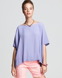 Give the basic tee a break and opt for this DIANE von FURSTENBERG silk top, rendered in a boxy silhouette with short dolman sleeves that drape easily below the hem for effortless chic. Give the basic tee a break and opt for this DIANE von FURSTENBERG silk top, rendered in a boxy silhouette with short dolman sleeves that drape easily below the hem for effortless chic.