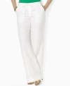 Chic wide-leg plus size pants are updated for the season, rendered in breezy washed linen, from Lauren by Ralph Lauren.