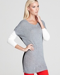 The perfect partner to your skinny jeans, Aqua's color-blocked sweater makes weekend style simple. The perfect partner to your skinny jeans, Aqua's color-blocked sweater makes weekend style simple.