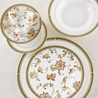 Oberon's delicate floral pattern recalls the first blossoms of spring, yet is understated enough to complement any table decor. Bone china.