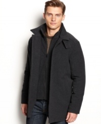 Understated, classic and elegant. This Calvin Klein coat features everything a well-dressed man needs to make a subtle statement. Understated, classic and elegant. This Calvin Klein coat features everything a well-dressed man needs to make a subtle statement.