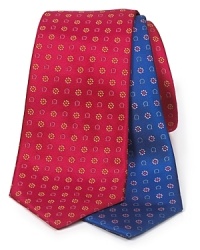 A luxurious piece that lies at the center of your dress wardrobe, this handsome tie from Salvatore Ferragamo is crafted in 100% Italian silk. A luxurious piece that lies at the center of your dress wardrobe, this handsome tie from Salvatore Ferragamo is crafted in 100% Italian silk.