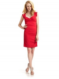 THE LOOKCrossover sweetheart necklineCap sleevesEmpire waistSide ruchingBack zip closureBack puckered detailsTHE FITAbout 34 from shoulder to hemTHE MATERIAL95% polyester/5% spandexFully linedCARE & ORIGINDry cleanMade in USAModel shown is 5'10 (177cm) wearing US size 4. THE LOOKCrossover sweetheart necklineCap sleevesEmpire waistSide ruchingBack zip closureBack puckered detailsTHE FITAbout 34 from shoulder to hemTHE MATERIAL95% polyester/5% spandexFully linedCARE & ORIGINDry cleanMade in USAModel shown is 5'10 (177cm) wearing US size 4.