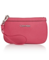 Take an elegant approach to everyday accessorizing with this grab-and-go design from Calvin Klein. Crafted from soft Saffiano leather with gleaming hardware, it goes from day-to-night without missing a beat. Take an elegant approach to everyday accessorizing with this grab-and-go design from Calvin Klein. Crafted from soft Saffiano leather with gleaming hardware, it goes from day-to-night without missing a beat.