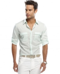 Roll up your sleeves and get to work on having great style with this button front shirt from Calvin Klein. Roll up your sleeves and get to work on having great style with this button front shirt from Calvin Klein.