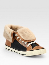 Trend-forward leather and flannel basic, lined with plush shearling for a textured look. Leather and flannel upperShearling liningRubber solePadded insoleImportedThis style runs true to size. We recommend ordering your usual size for a standard fit. Trend-forward leather and flannel basic, lined with plush shearling for a textured look. Leather and flannel upperShearling liningRubber solePadded insoleImportedThis style runs true to size. We recommend ordering your usual size for a standard fit.