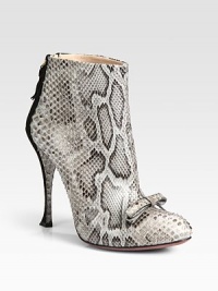 Exude confidence in this scintillating design of genuine python and suede, topped with a petite bow. Suede-covered heel, 4¼ (110mm)Python and suede upperBack zipLeather lining and solePadded insoleMade in ItalyOUR FIT MODEL RECOMMENDS ordering one half size up as this style runs small. Exude confidence in this scintillating design of genuine python and suede, topped with a petite bow. Suede-covered heel, 4¼ (110mm)Python and suede upperBack zipLeather lining and solePadded insoleMade in ItalyOUR FIT MODEL RECOMMENDS ordering one half size up as this style runs small.