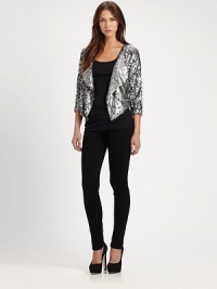 Embrace the wow factor in this cropped sequin blazer with dolman sleeves and a contour hem. Oversized shawl collarThree-quarter dolman sleevesContoured cropped back hemAbout 23 from shoulder to hemViscoseDry cleanImportedModel shown is 5'9 (176cm) wearing US size Small. Embrace the wow factor in this cropped sequin blazer with dolman sleeves and a contour hem. Oversized shawl collarThree-quarter dolman sleevesContoured cropped back hemAbout 23 from shoulder to hemViscoseDry cleanImportedModel shown is 5'9 (176cm) wearing US size Small.