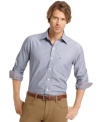 Contrast cuffs and a slim fit gives this stripe Izod shirt the perfect modern style.