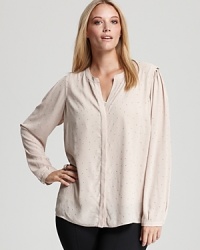 Downtown edge meets effortless bohemia as studded embellishment punctuates a sheer DKNY Plus blouse for an refreshing style mix. Downtown edge meets effortless bohemia as studded embellishment punctuates a sheer DKNY Plus blouse for an refreshing style mix.