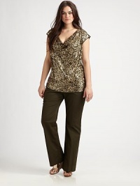 Shimmer and shine this season in this sequined-front design with a jersey back. The draped neckline is feminine and the cap sleeves provide flattering arm coverage.Draped necklineCap sleevesSequined frontPull-on styleAbout 27 from shoulder to hemRayonHand washImported Shimmer and shine this season in this sequined-front design with a jersey back. The draped neckline is feminine and the cap sleeves provide flattering arm coverage.Draped necklineCap sleevesSequined frontPull-on styleAbout 27 from shoulder to hemRayonHand washImported
